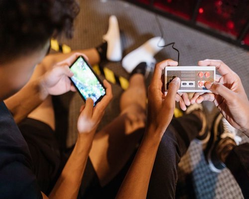Angled smartphone showing the fictional Southern Signal Ops mobile game